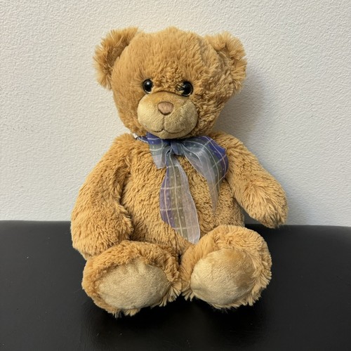 Brown teddy bear with - teddy, bow