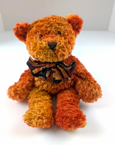 Vintage plushland orange teddy - vintage,