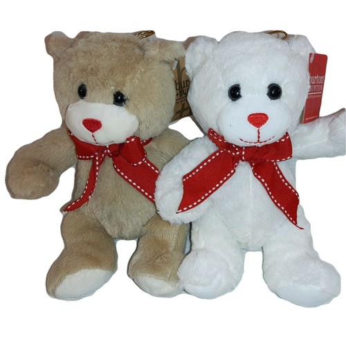White and tan teddy - bears, with